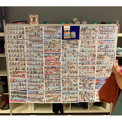 folding display board used in a school with images attached